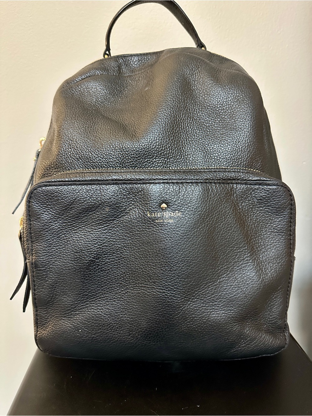 kate spade Black Pebbled Leather Backpack with Gold Logo